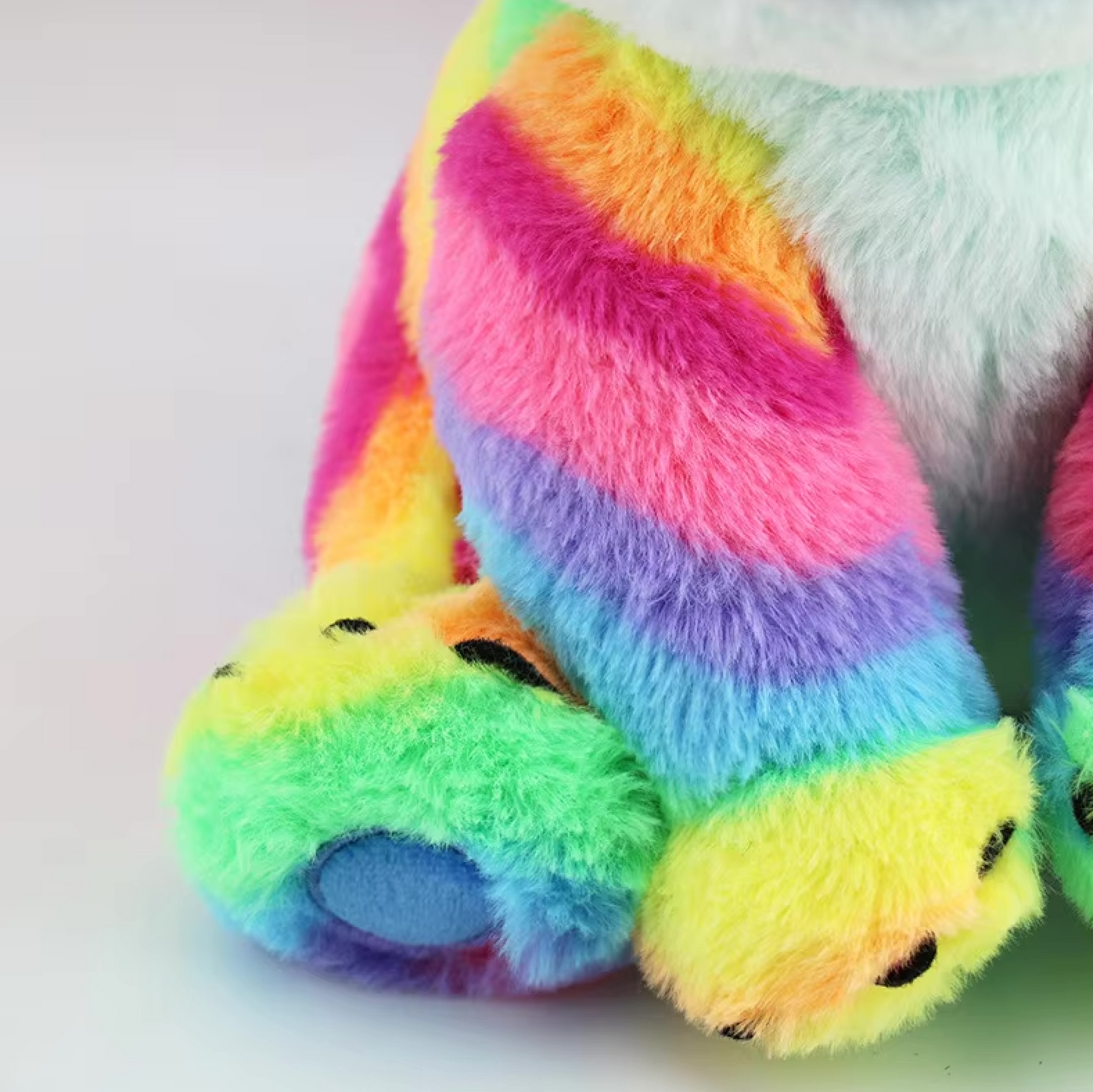 Egg horn plush toy with rainbow colors