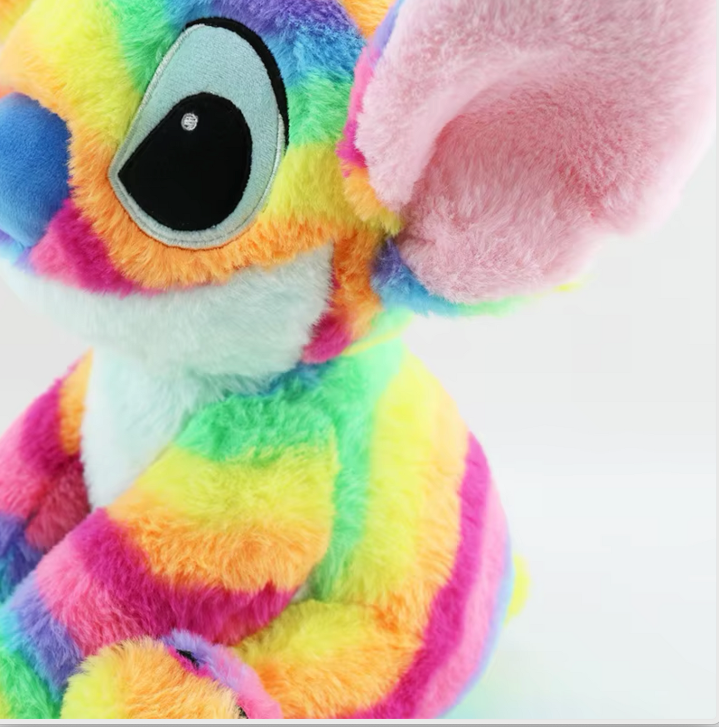 Egg horn plush toy with rainbow colors