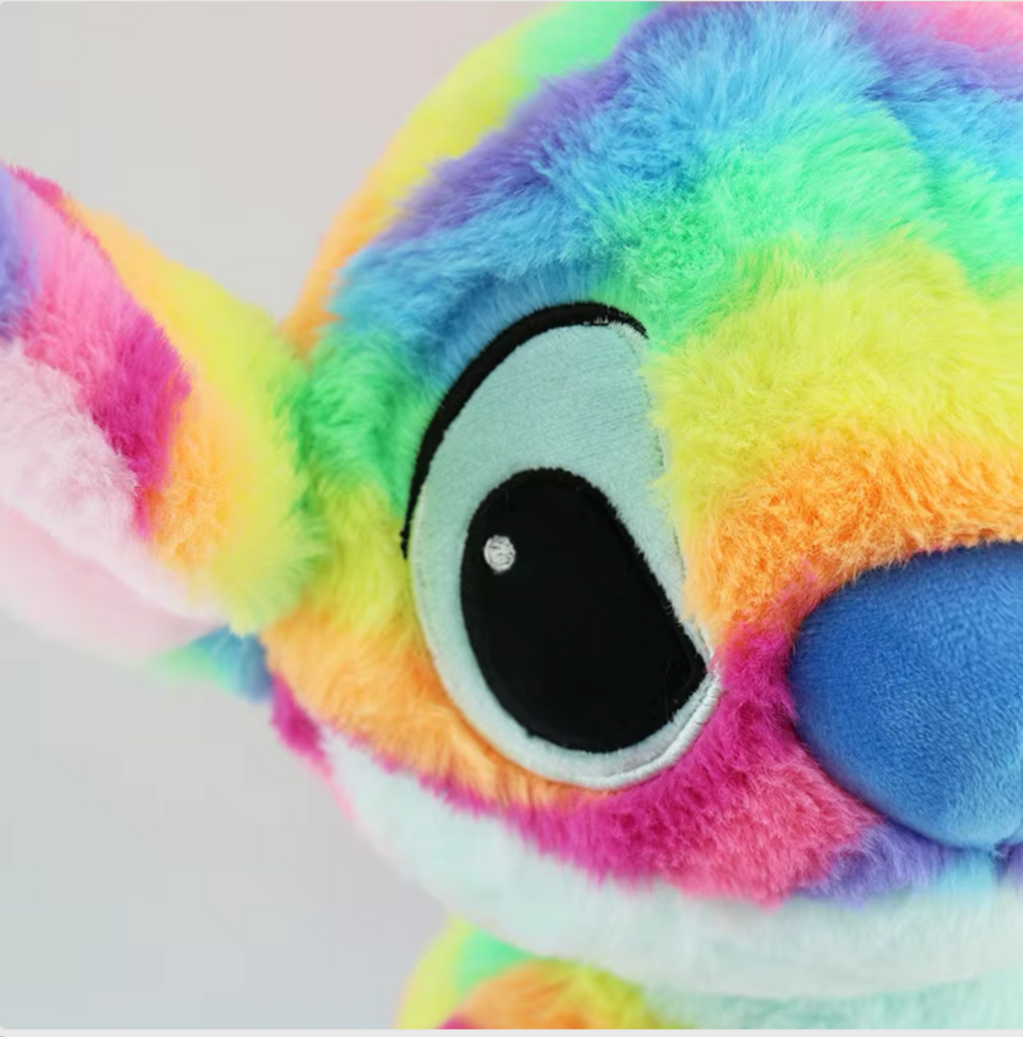 Egg horn plush toy with rainbow colors